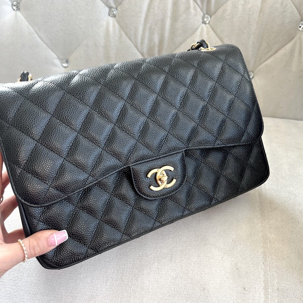 Chanel Jumbo double flap caviar gold hardware.